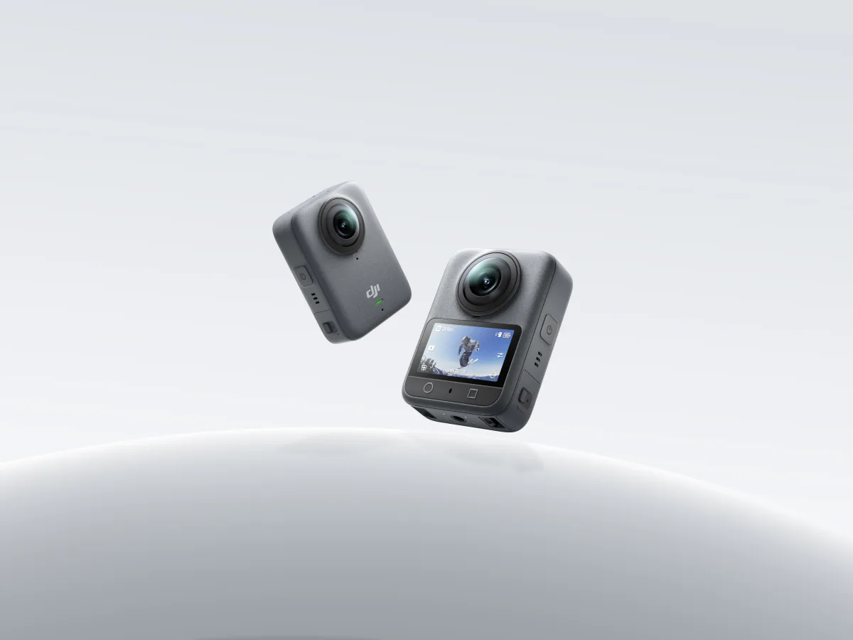 DJI Osmo 360 shown from the front and rear on a pale studio background