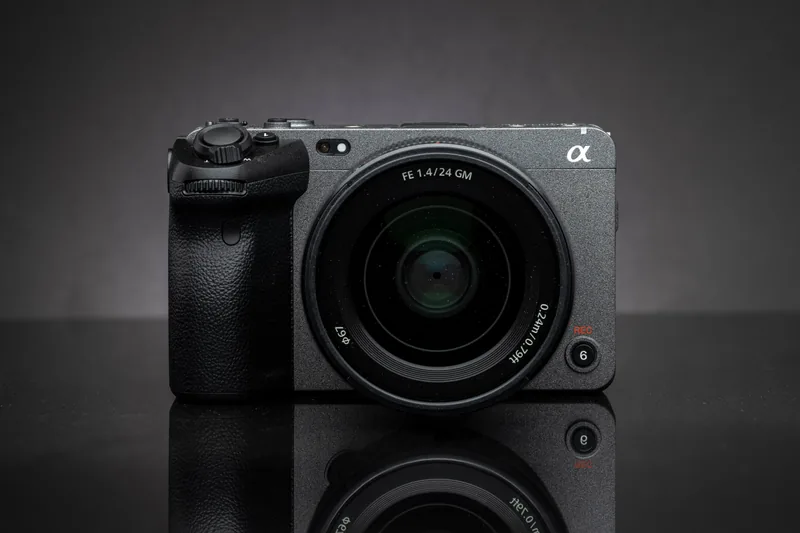 Original Sony FX3 with a Sony FE 24mm F1.4 GM lens on a dark reflective surface