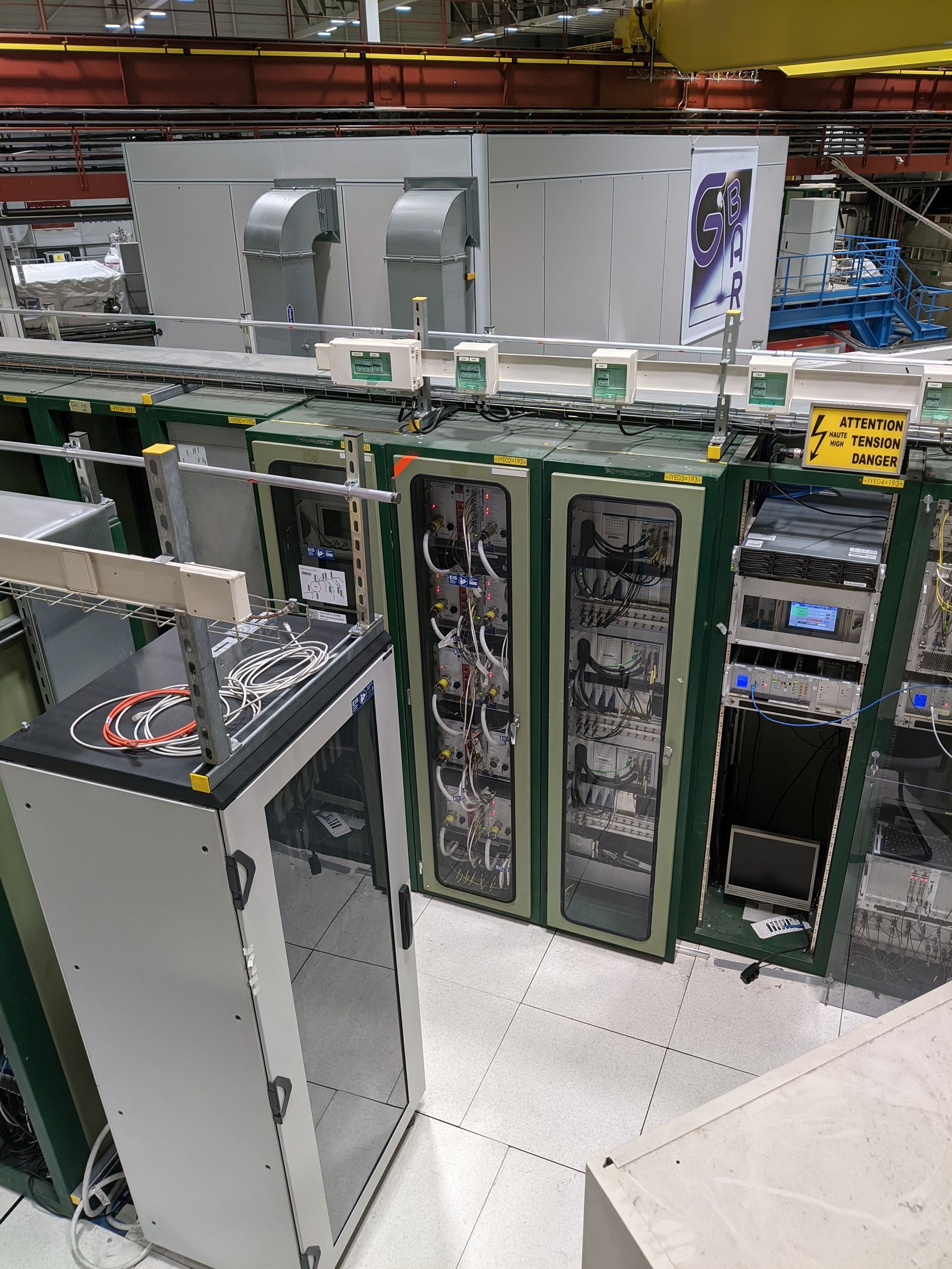 Archive photograph of server racks near CERN’s GBAR experiment, captured February 23, 2024; not a Cloudflare or Clairic installation.