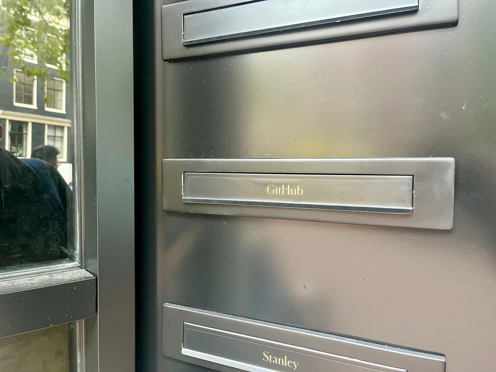Archive photograph of the GitHub office letterbox in Spuistraat, Amsterdam, captured November 9, 2023.