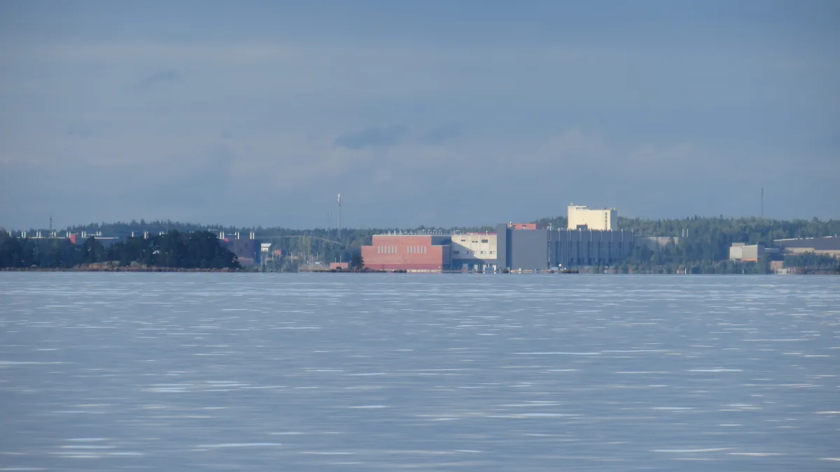 Google's Hamina data-centre buildings on the far shore of a broad stretch of water in Finland.