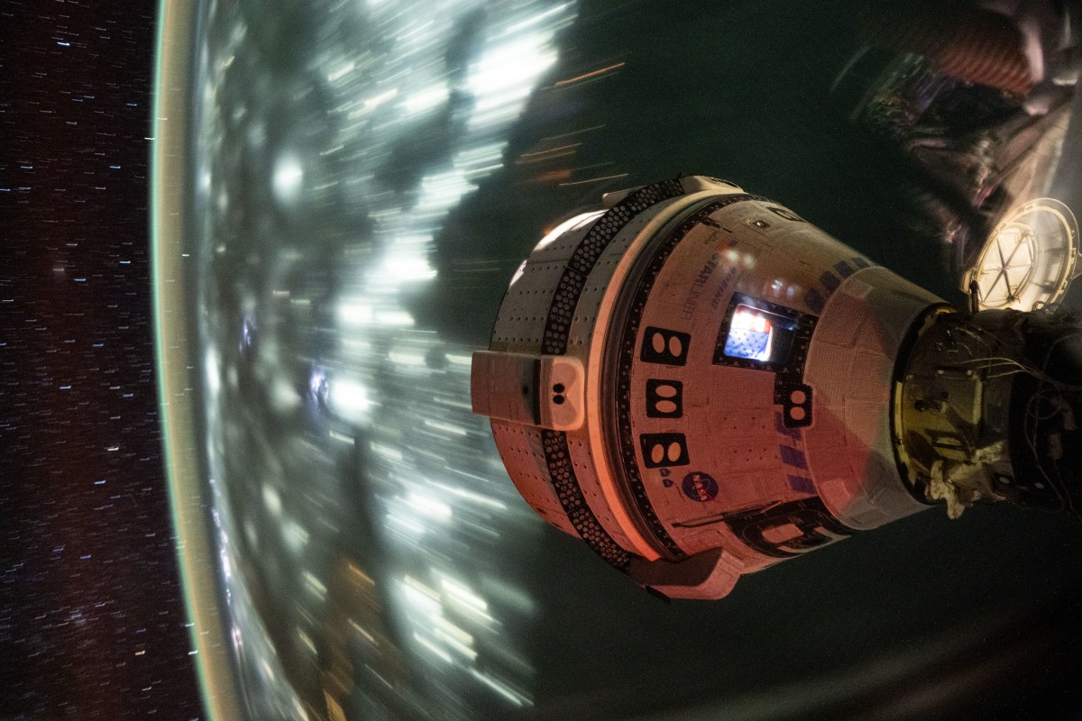 Boeing Starliner docked at the International Space Station above Earth in a NASA photograph from July 2024.