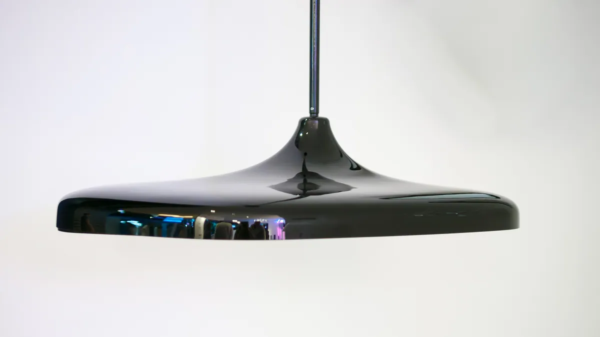 Black Philips Hue pendant lamp photographed at IFA Berlin in 2018.