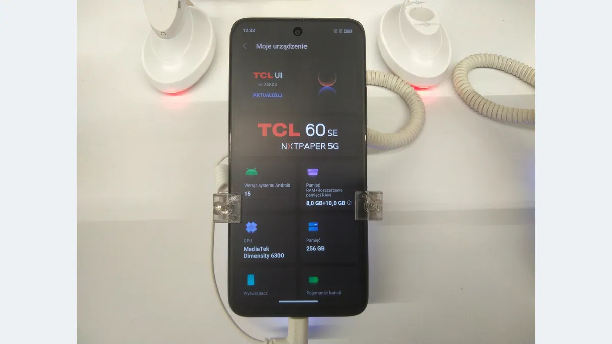 An earlier TCL 60 SE NXTPAPER 5G handset on a retail display in 2025.